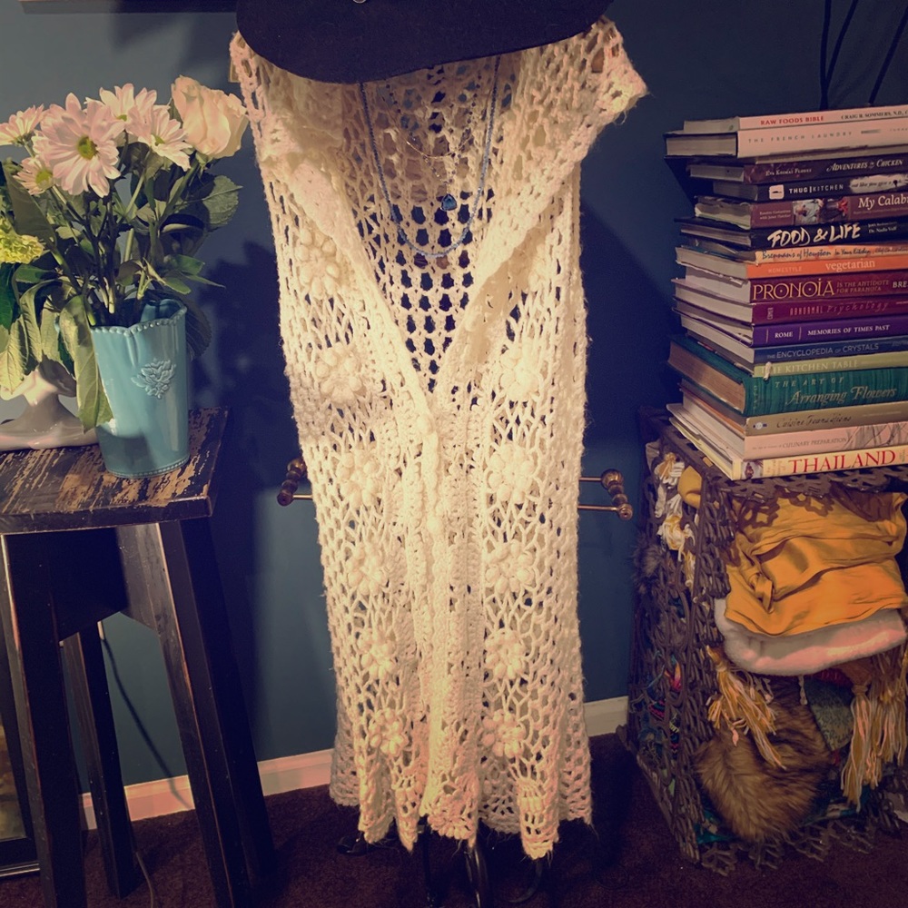 Long sleeveless vest
